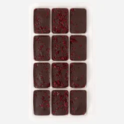Chocolats noirs fourrés à la framboise et au fruit de la passion