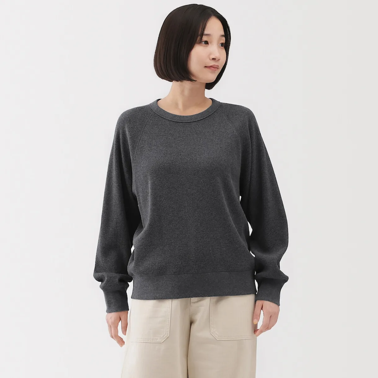 Pull à col rond en coton biologique tricoté gaufré pour femme