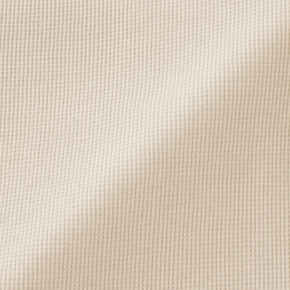 Pull à col rond en coton biologique tricoté gaufré pour femme