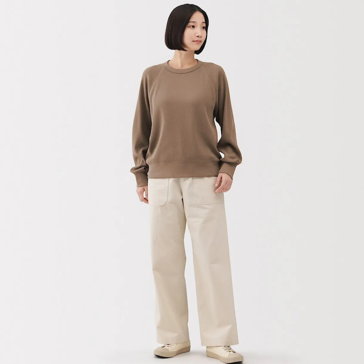 Pull à col rond en coton biologique tricoté gaufré pour femme