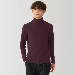 Pull en laine côtelée col roulé homme