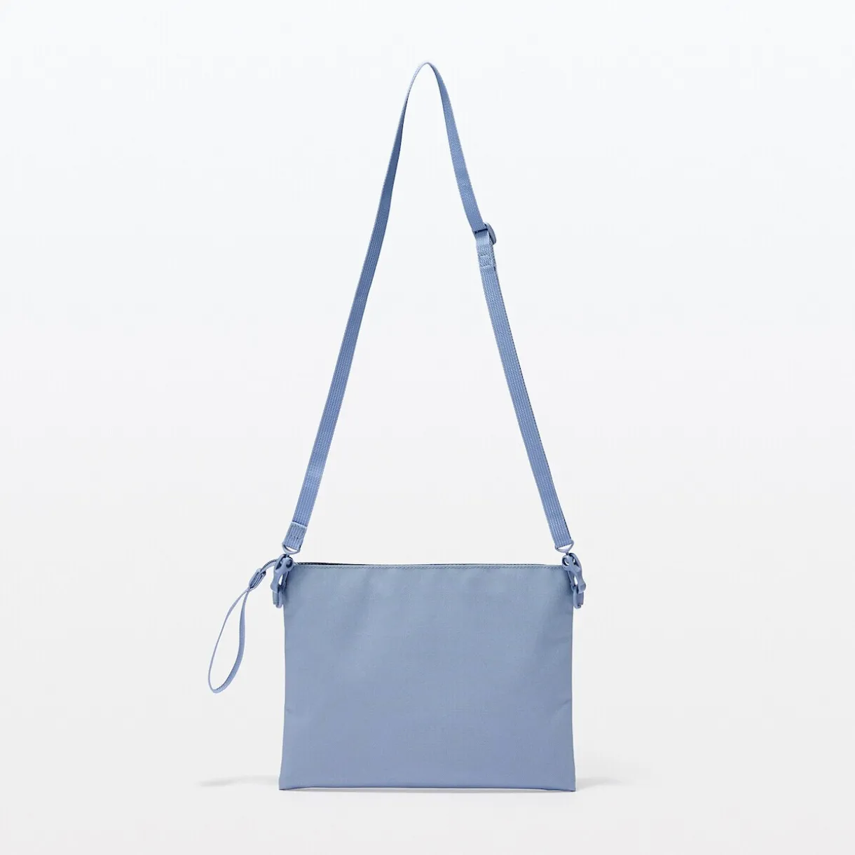 Sacoche à bandoulière déperlante détachable.