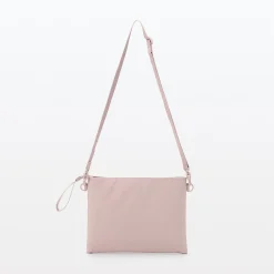 Sacoche à bandoulière déperlante détachable.