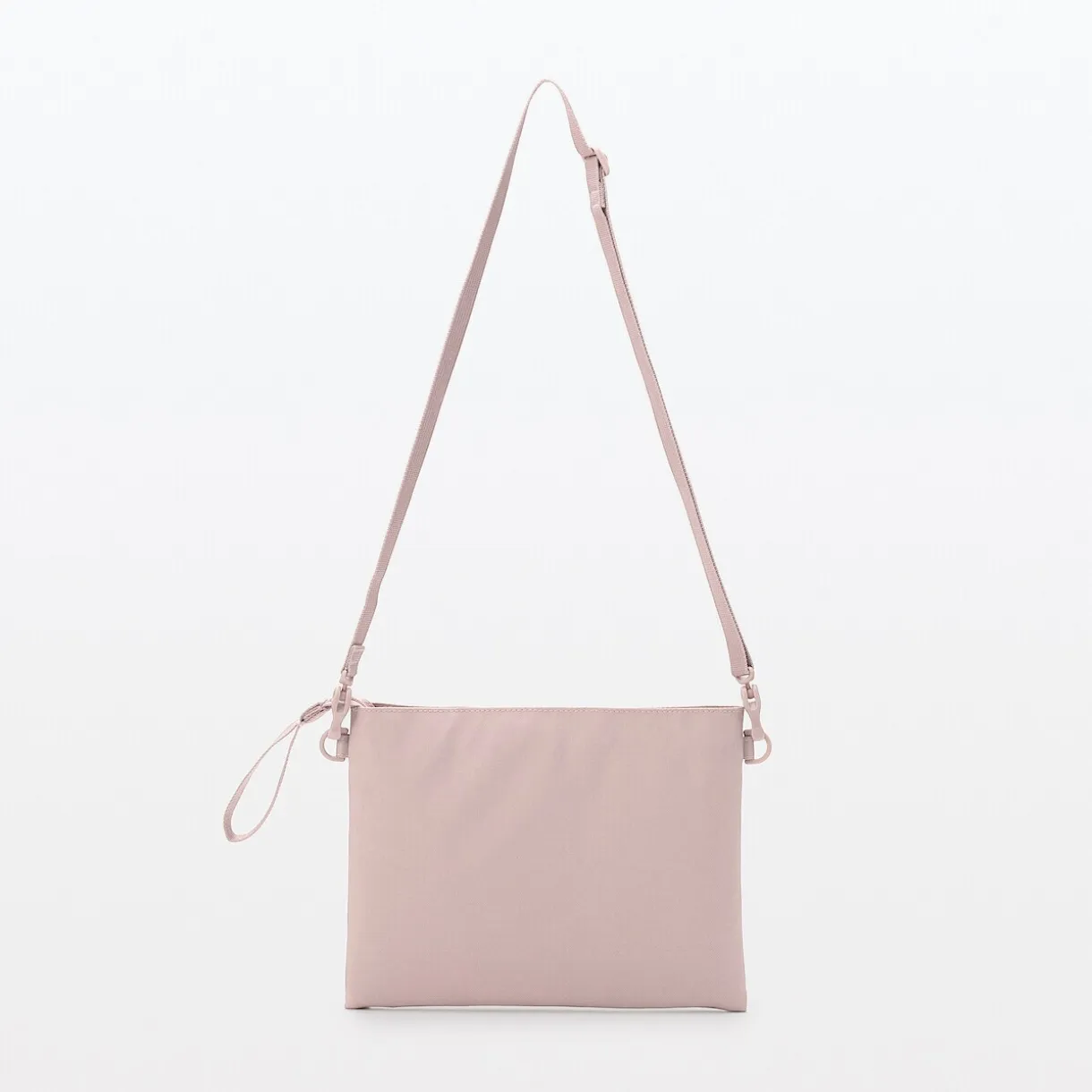 Sacoche à bandoulière déperlante détachable.